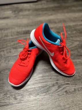 Nike Red Athletic Sneakers with Teal Inner Lining